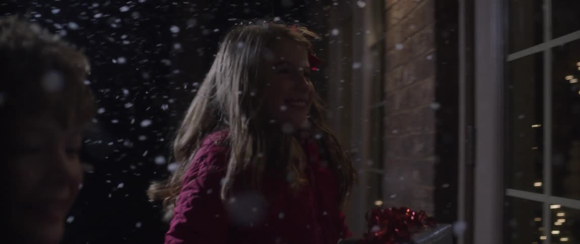 Kids running towards a door in the snow
