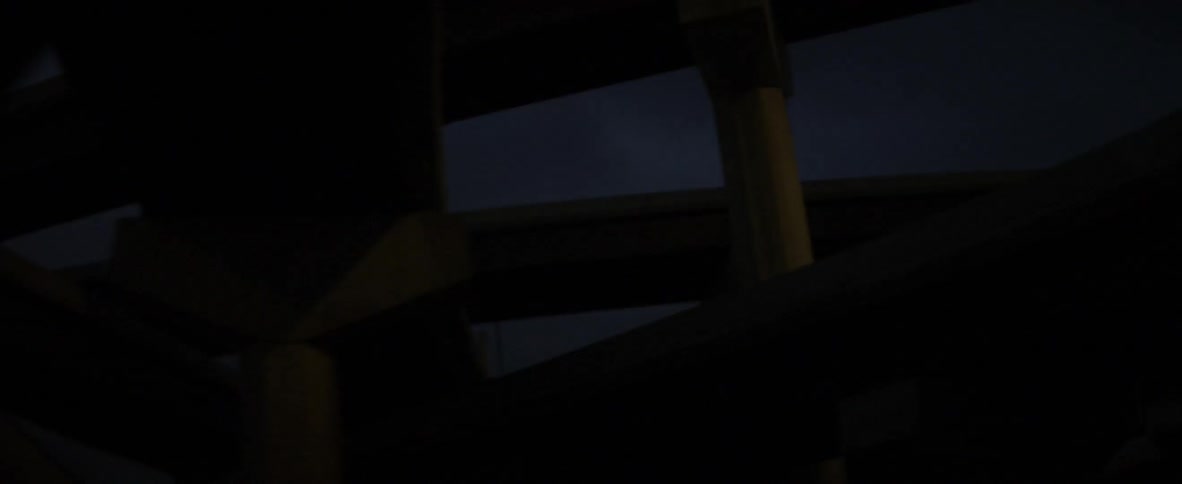 City at night faintly lit by a street light