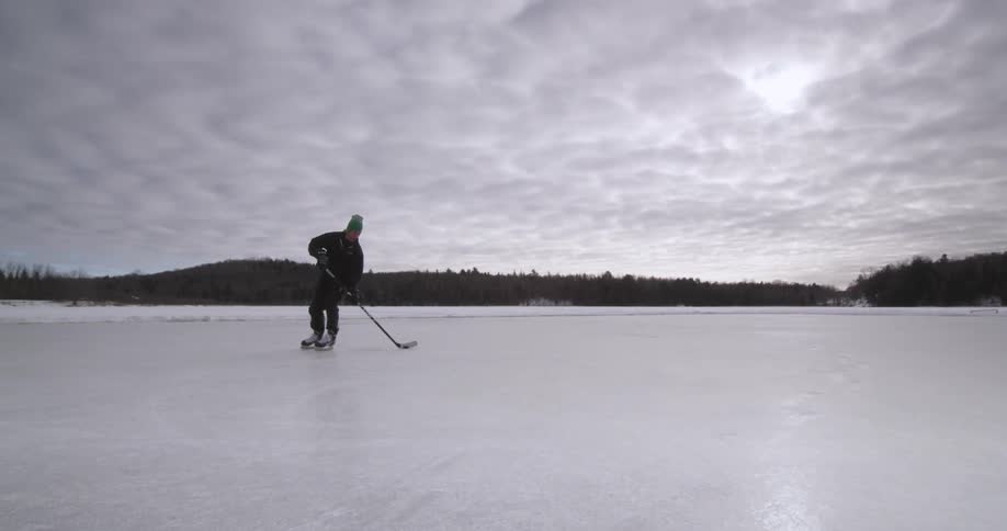 A person playing ice hockey
