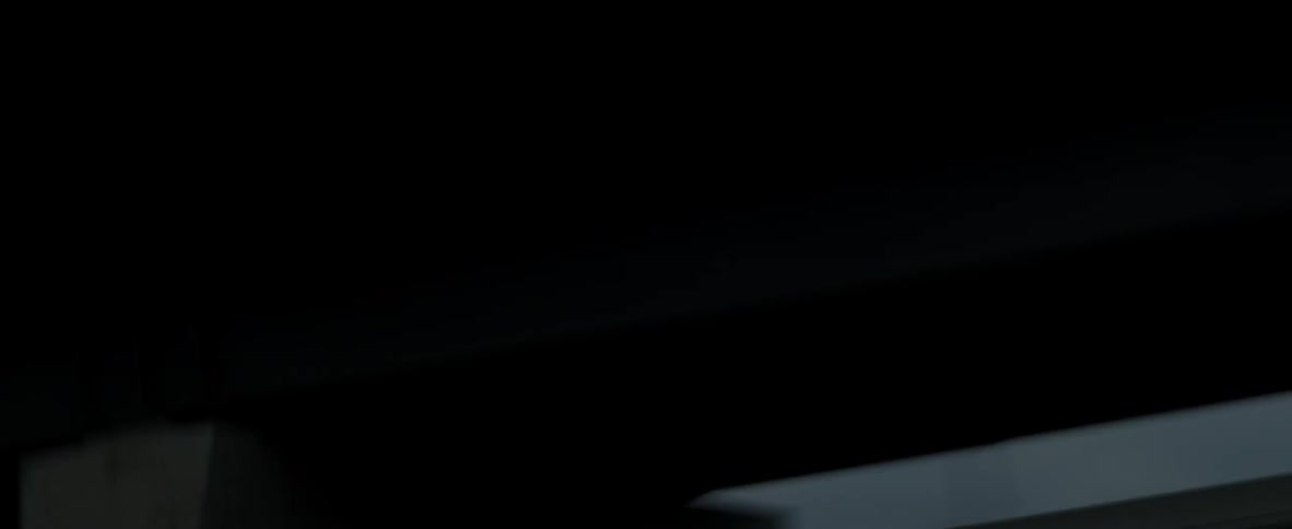 A car is racing on the roadside