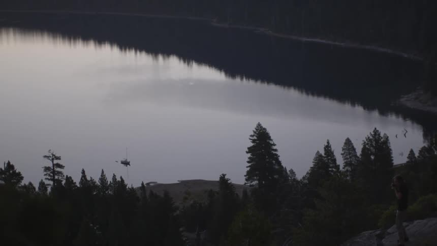 The lake water is calm below