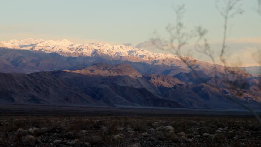 Snow covered mountains at sunrise