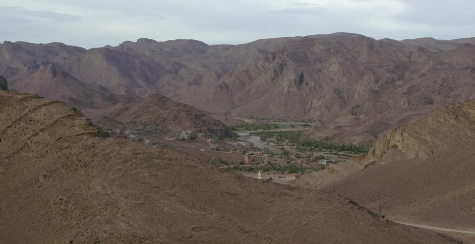 The canyon ahead has some water in the middle