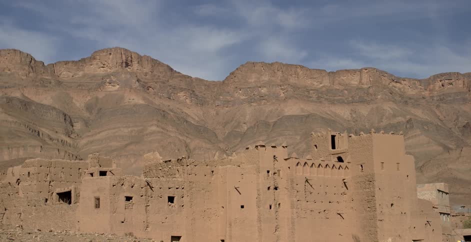 Buildings carved out of a mountainside