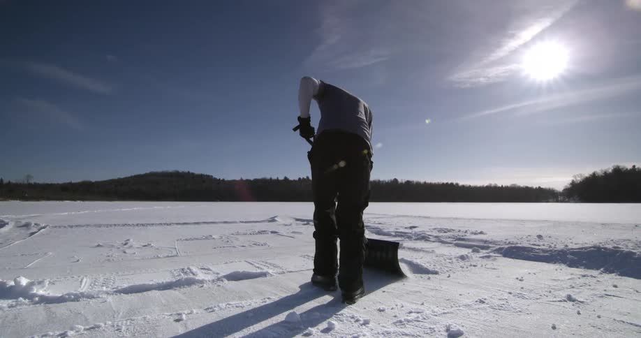 A person shoveling snow