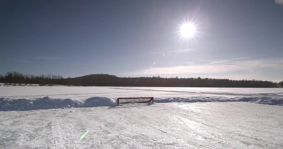 Snow covered field on a sunny day