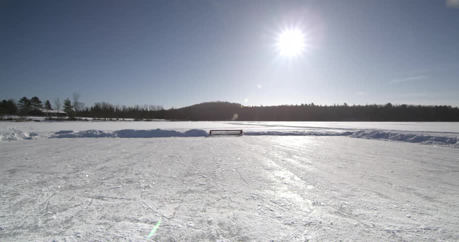 View of a snow filled filed on a sunny day