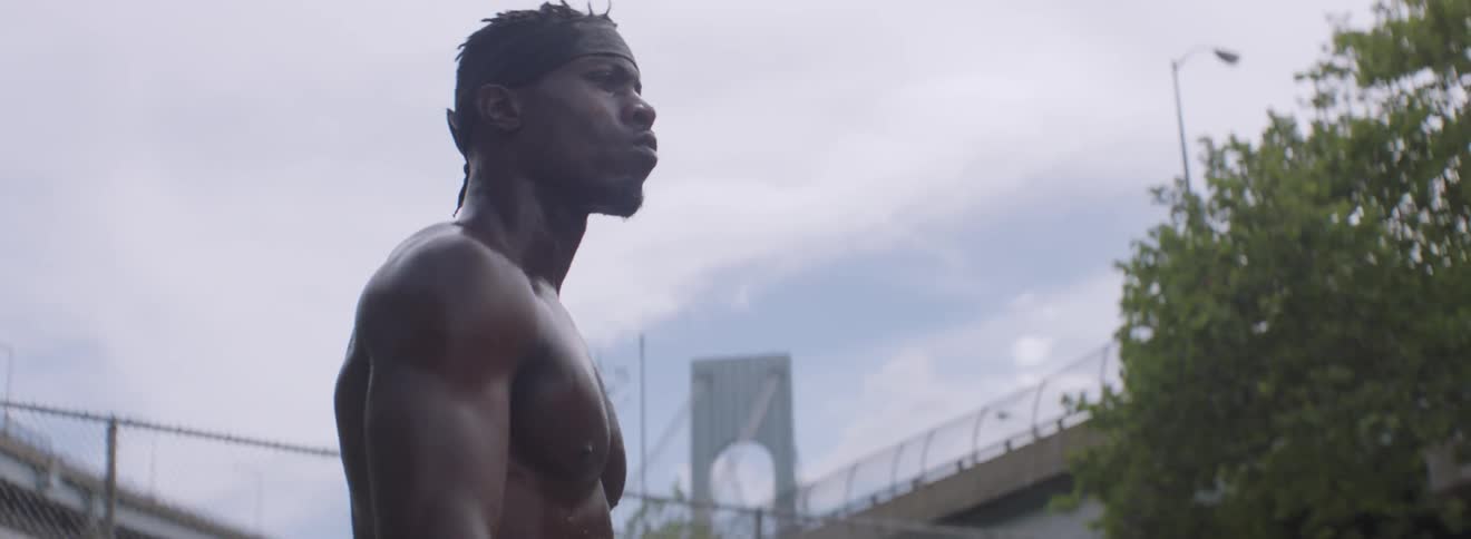 A man is sweating walking around outside