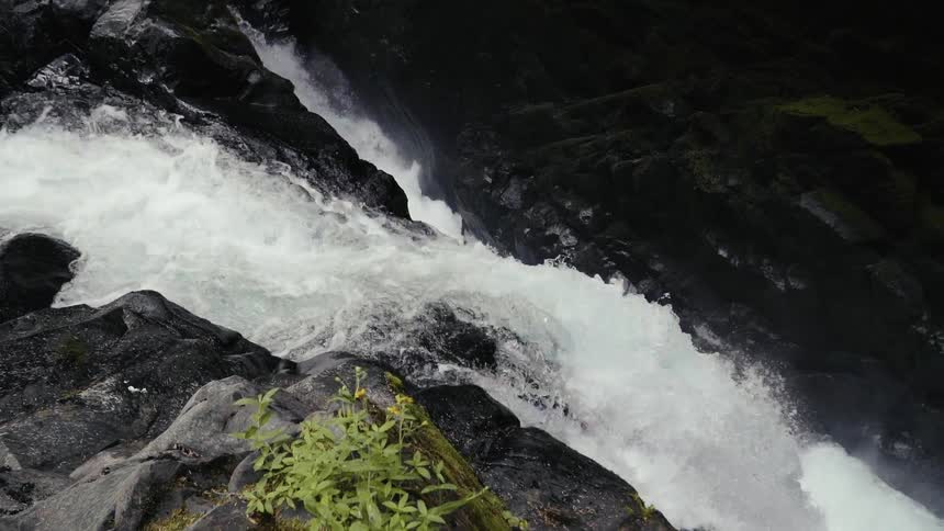 Water rushing down the side of a cliff
