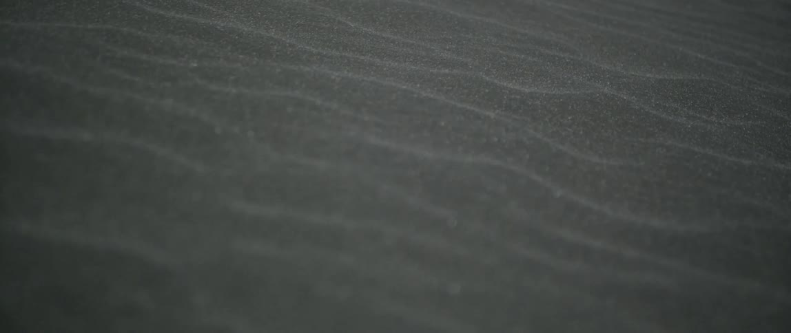 The sand has small ripples
