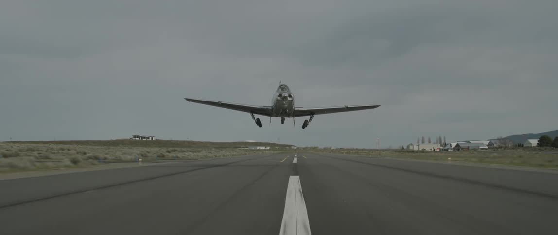 An airplane takes off from a landing strip