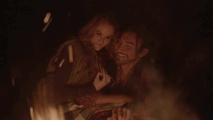Two lovers are staring at the fire