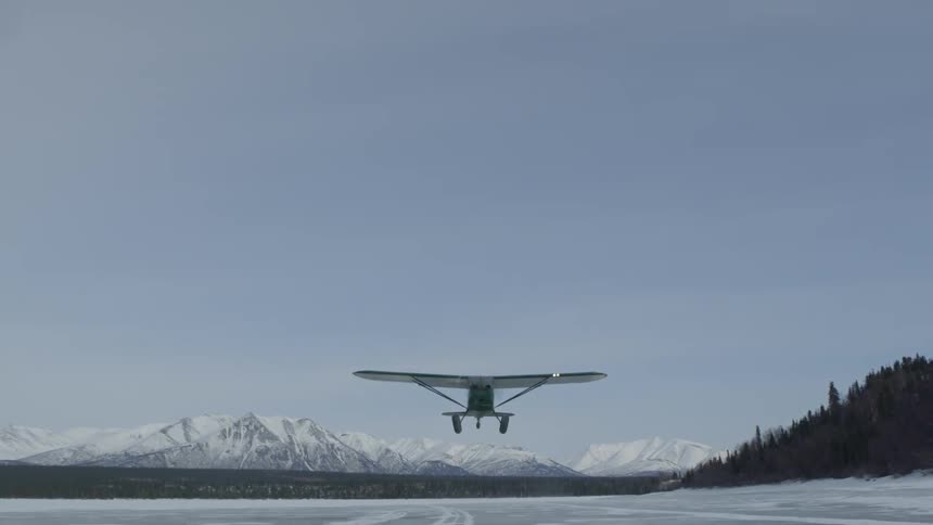 A plane taking off in Alaska