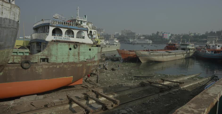 Ship yard filled with old rusty boats and parts