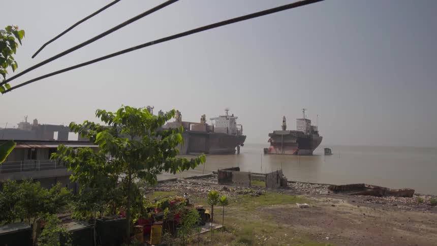There are many boats by the shore ahead