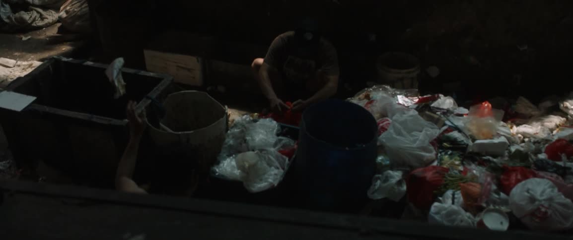 People sort items on a long table