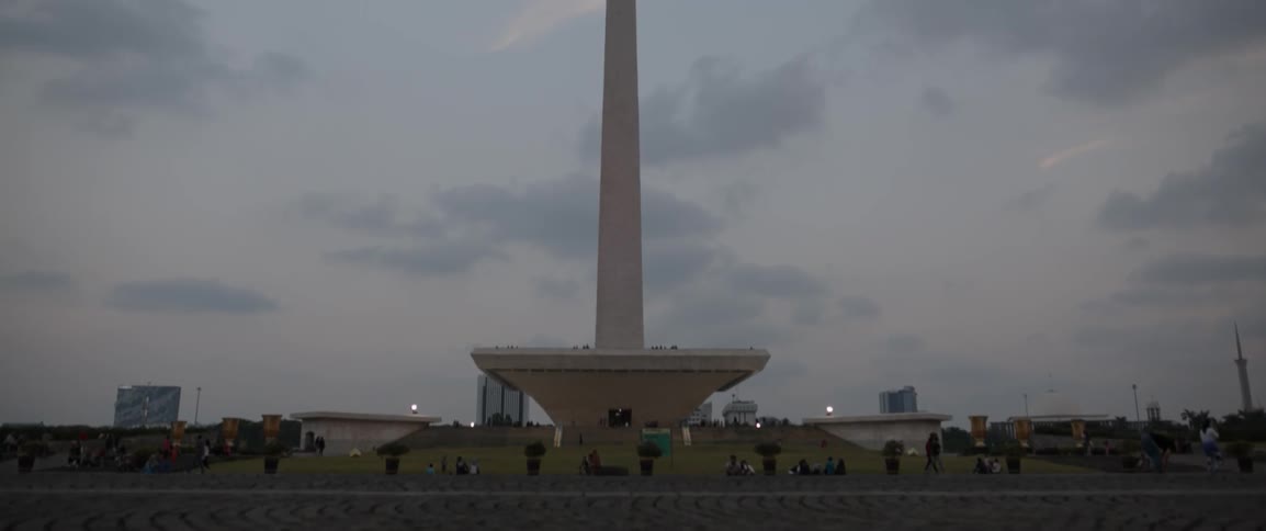 A tall monument at dusk