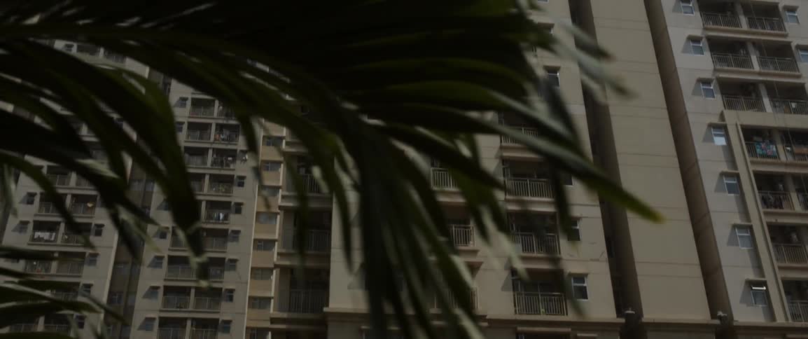 Apartment buildings tower into the sky