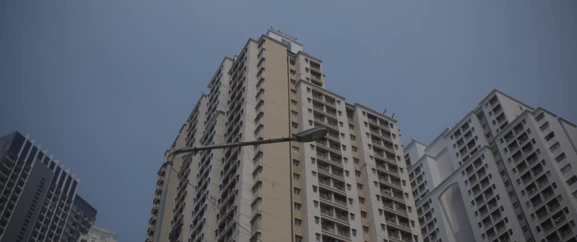 Apartment buildings tower into the sky