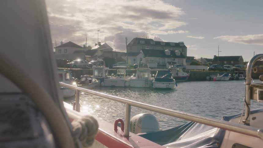 Boats are docked all over the pier