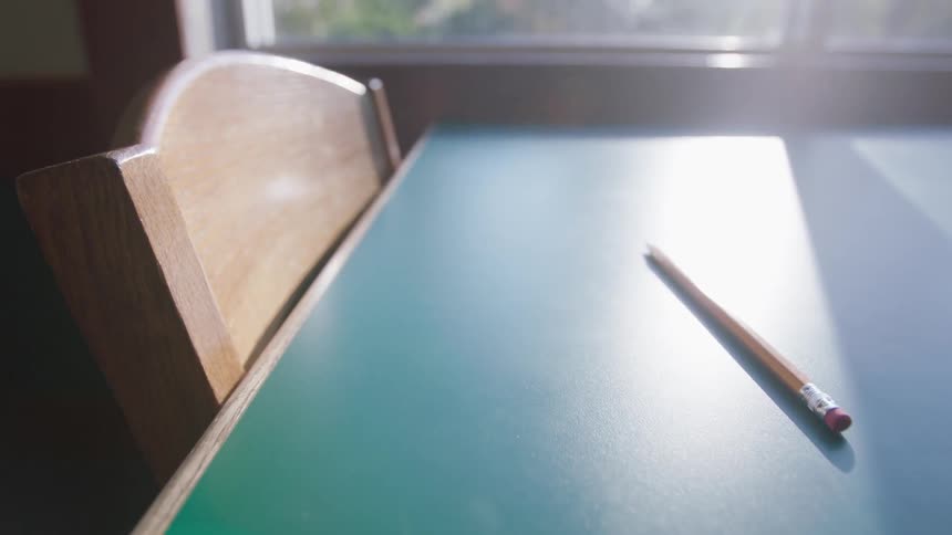 A pencil sits on a table