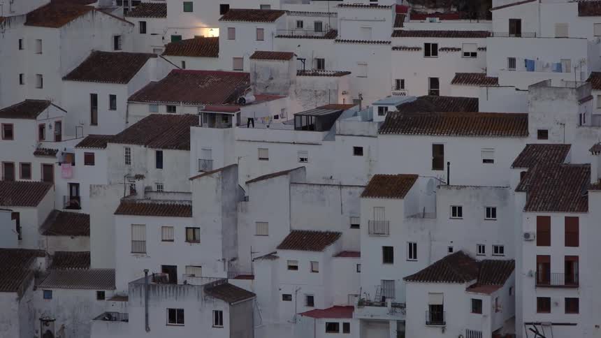A village full of white buildings that are very close together
