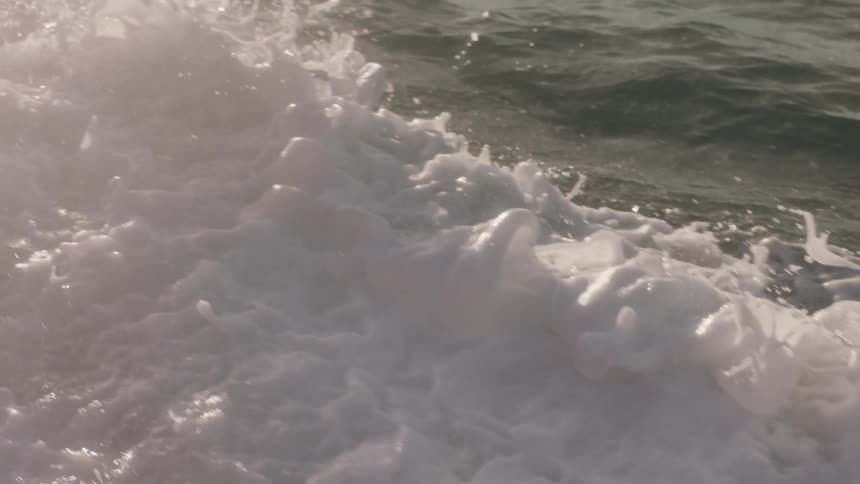 The water is very rough with large waves