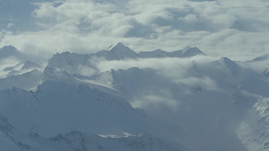 Aerial view of a mountain range on a cloudy day