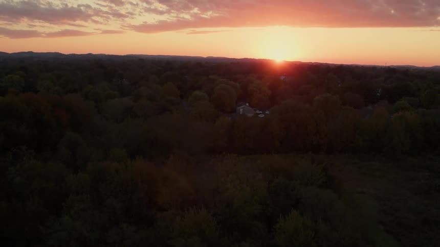The sun slowly sets over the horizon