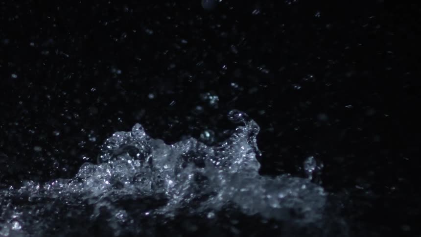 Water splashing up in droplets