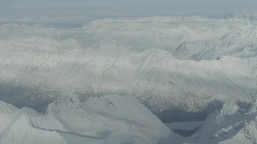 Aerial view of a snowy mountain range