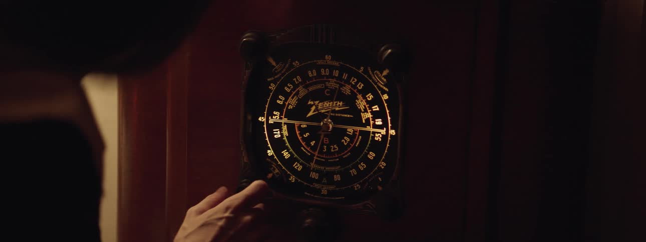 Person walks up to a large dial and turns it