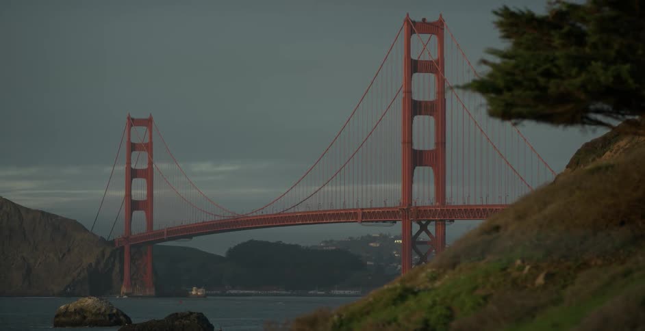 A large bridge spans over a waterway