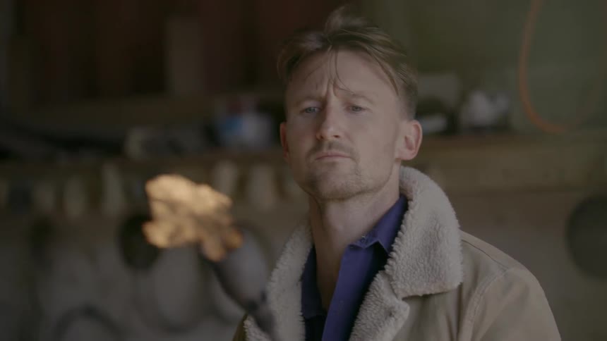 A man is using a large torch