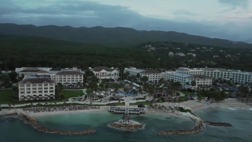 View of buildings on the beach on a cloudy day