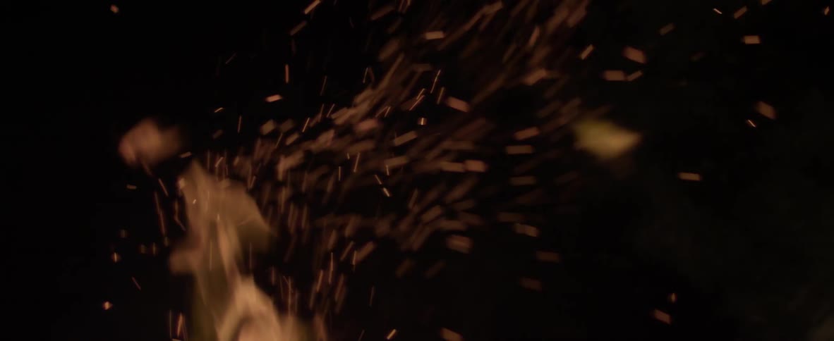 Fire burns brightly at night