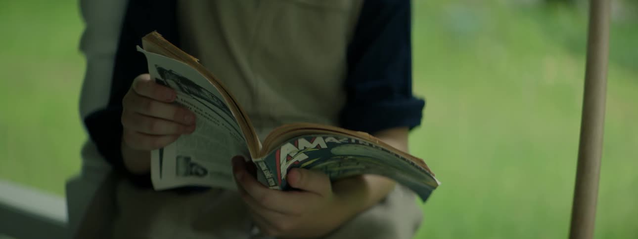 Someone is looking at a magazine