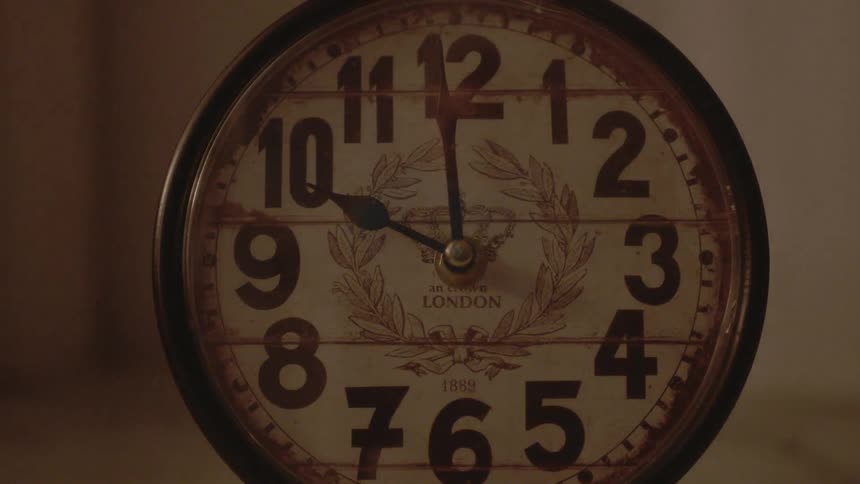 A clock reads ten