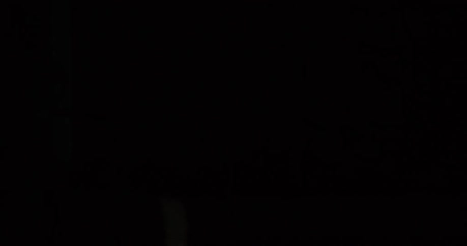 Lights shine on a sleeping child