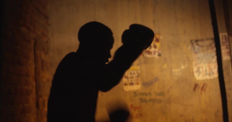 Boxer practices his boxing punches
