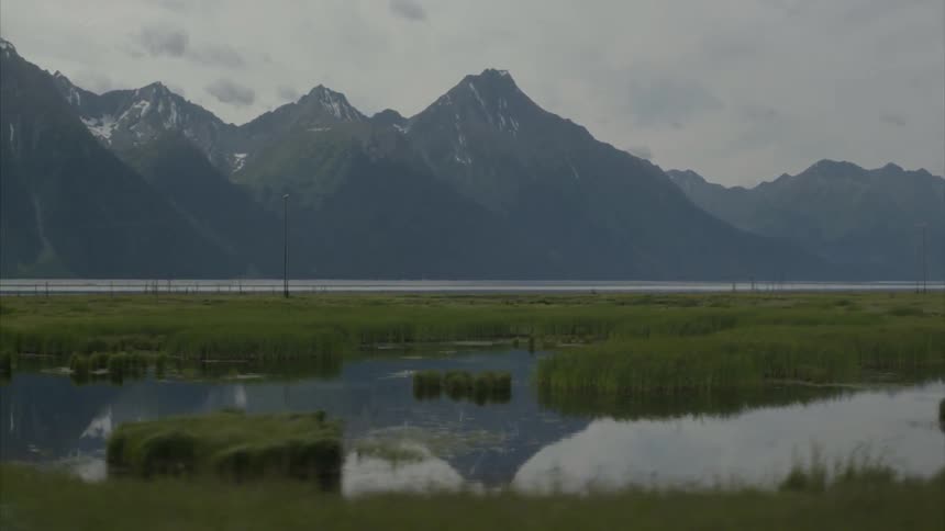 A lake at the base of a mountain