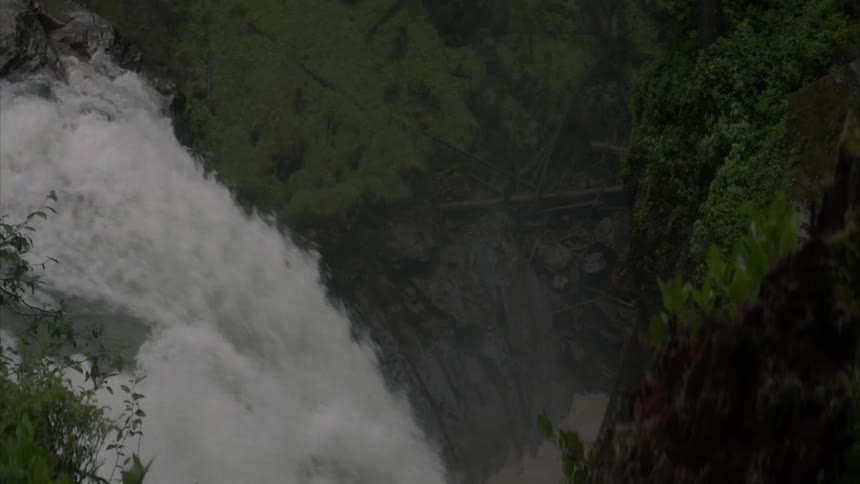 The waterfall is rushing water into the canal below