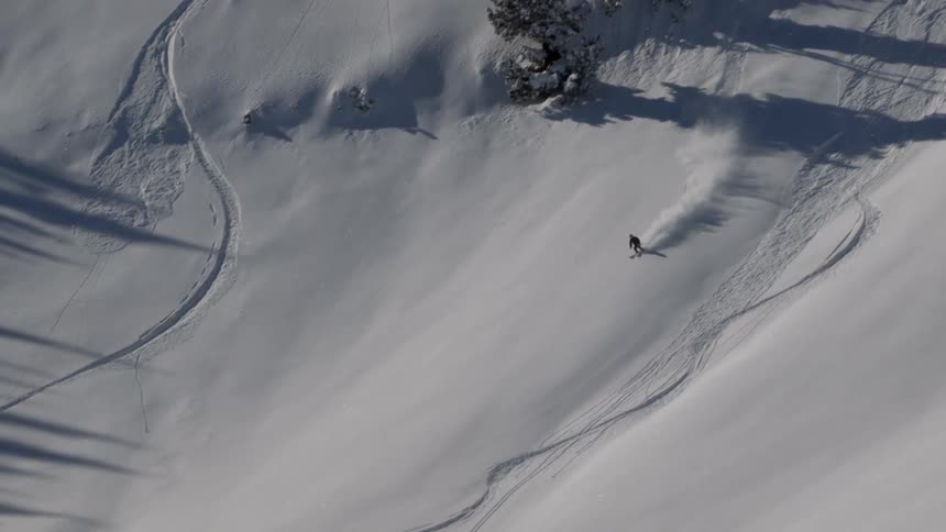 Person skiing down a large slope