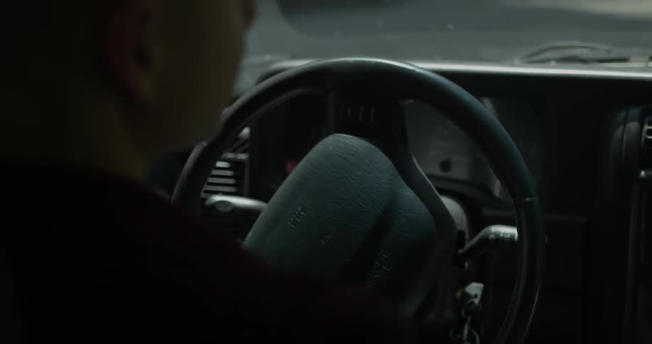 Man driving jeep on street during the day