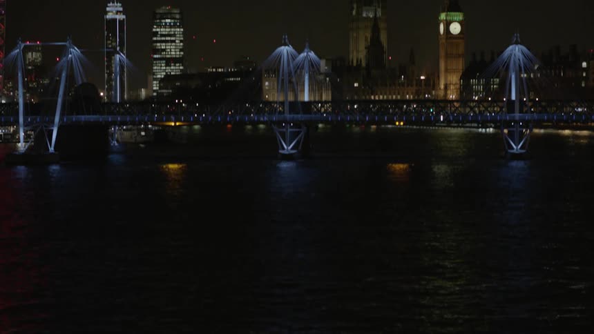 The city ahead has beautiful towers with lots of light