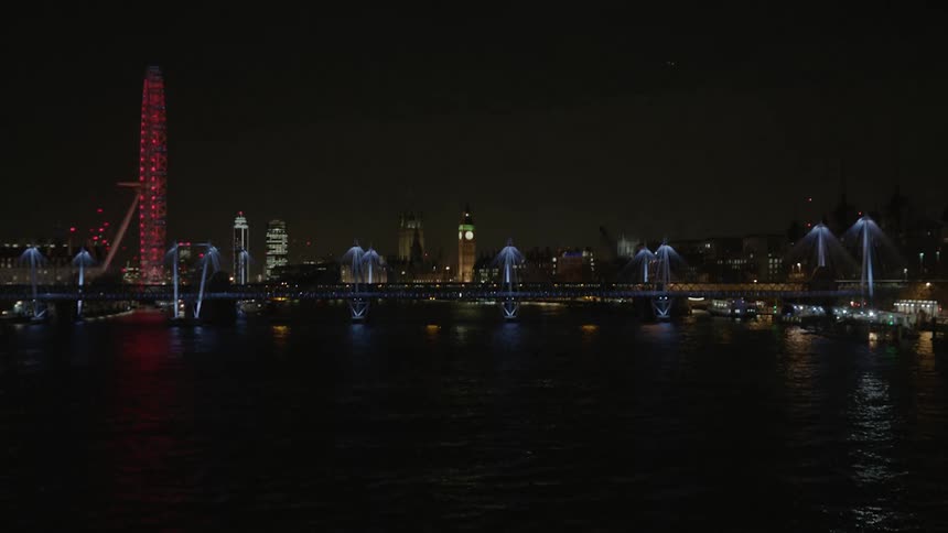 The river and skyline are being filmed at night