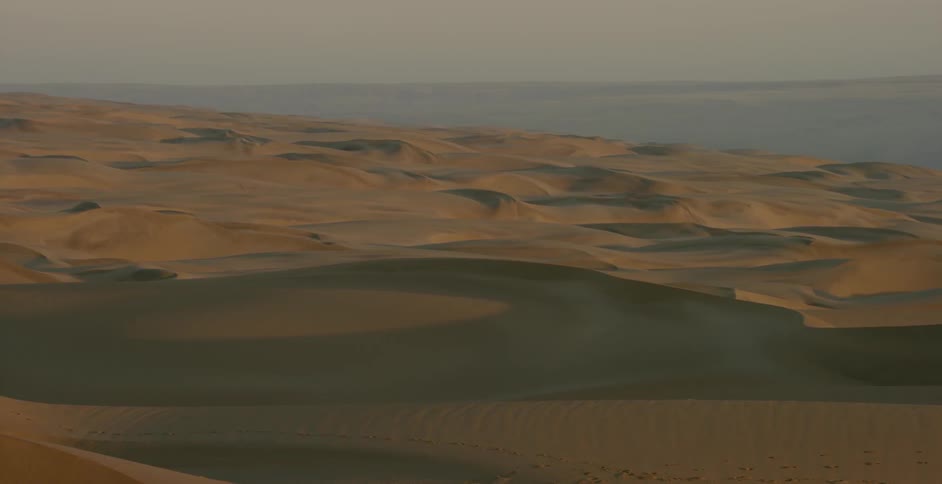 The desert is barren at sunset