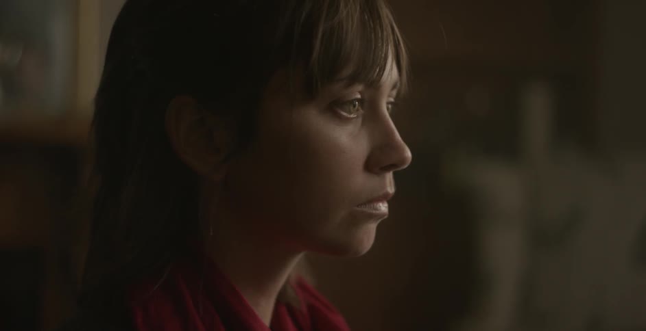 A woman is looking sad