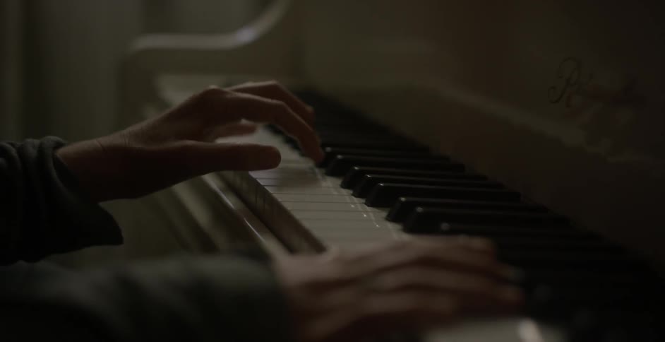 A person is playing the piano