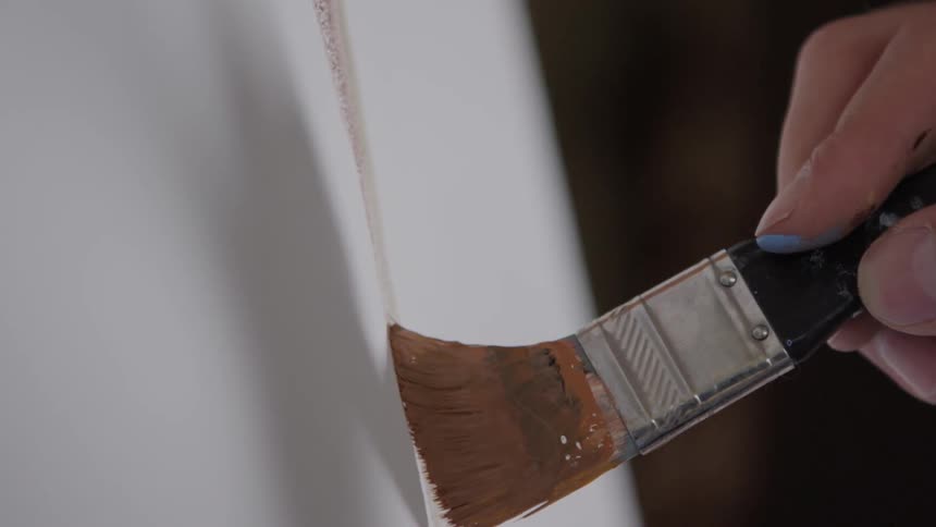 Person paints in slow motion